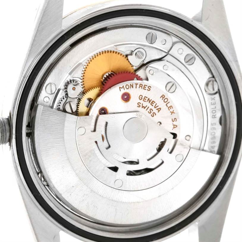 The image shows the movement and internal mechanism of a Rolex Datejust 16233 Men's Steel and Gold (two tone) Black Dial 16233 Men's Steel and Gold (two tone) Black Dial watch from the rear angle.