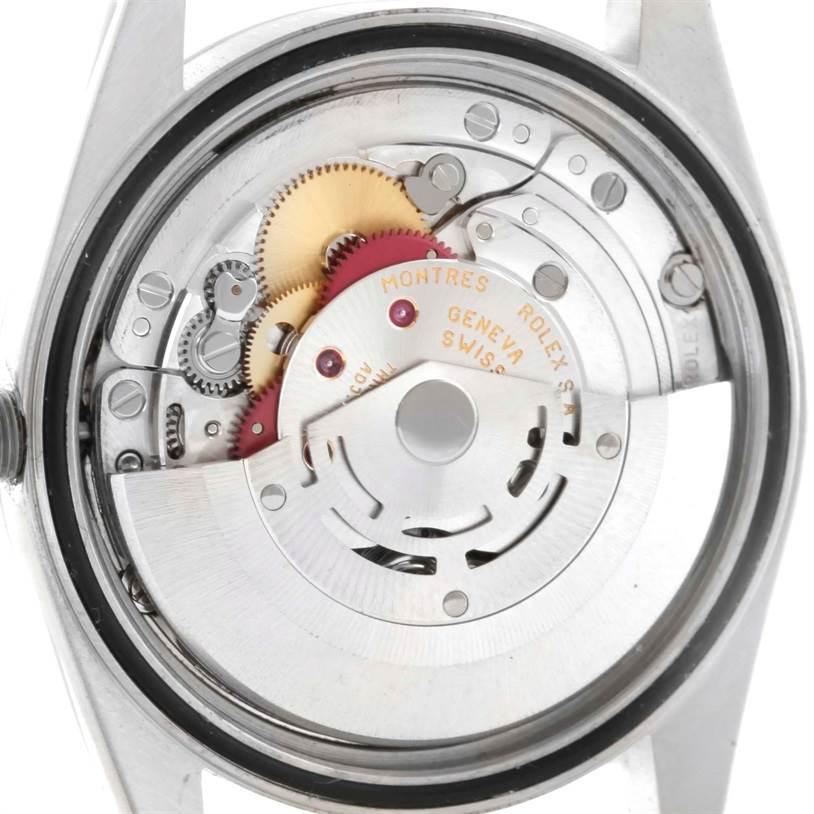 The image shows the internal movement and mechanism of a Rolex Datejust 16234 Men's Stainless Steel White Dial 16234 Men's Stainless Steel White Dial watch from the back angle.