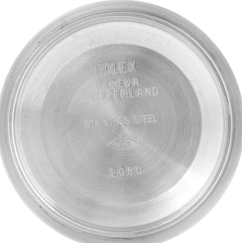 This is a top view of the back cover of a Rolex Datejust 16234 Men's Stainless Steel White Dial 16234 Men's Stainless Steel White Dial watch, showing engravings including the brand and model details.