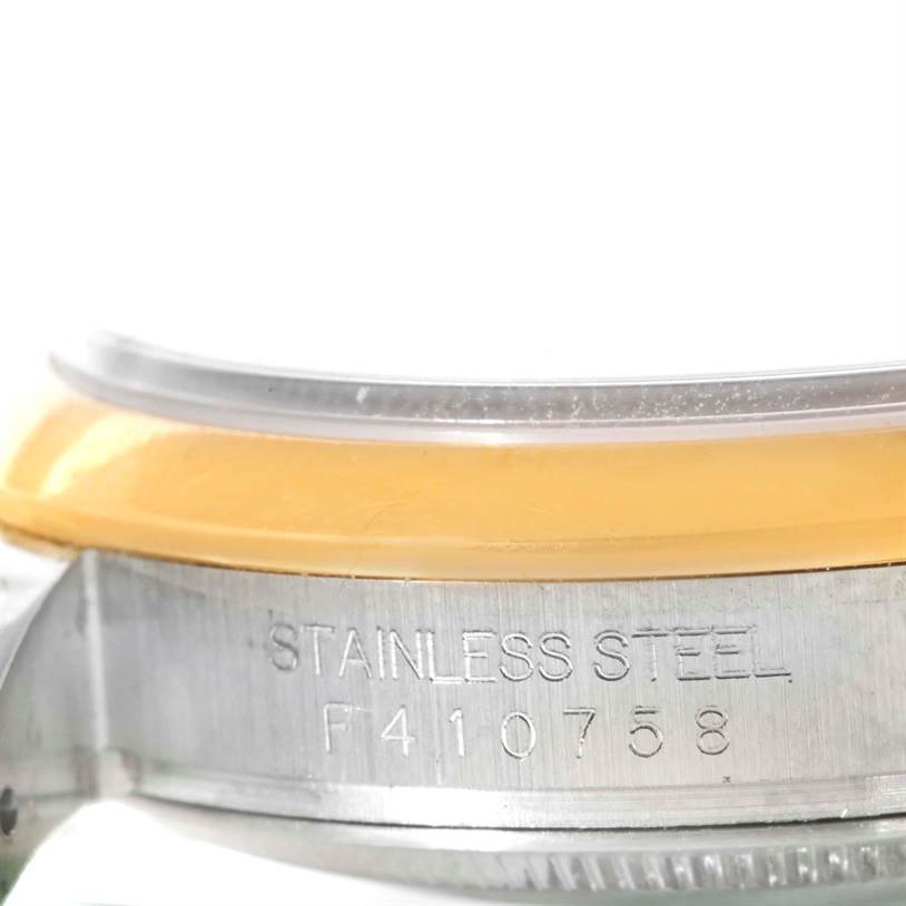 The image shows a close-up side angle of a Rolex Datejust 116203 Men's Stainless Steel Black Dial 116203 Men's Stainless Steel Black Dial watch, highlighting the stainless steel casing and part of the bezel.