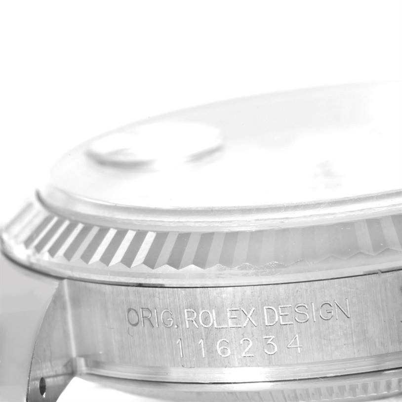 The image shows a close-up angle of the case and bezel of a Rolex Datejust 116234 Men's Stainless Steel White Dial 116234 Men's Stainless Steel White Dial, with the model number 116234 engraved.
