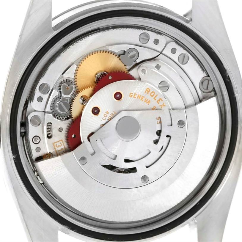 This image shows the inner mechanical movement and components of a Rolex Datejust 116200 Men's Stainless Steel Silver Dial 116200 Men's Stainless Steel Silver Dial watch from a back angle.
