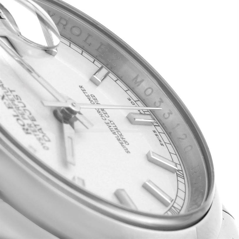 This close-up angle of the Rolex Datejust 116200 Men's Stainless Steel Silver Dial 116200 Men's Stainless Steel Silver Dial shows the dial and part of the rehaut with engraved Rolex branding.