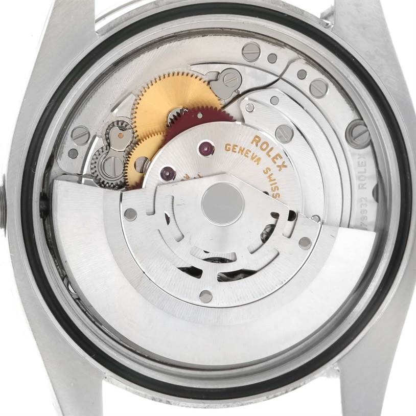This image shows the inside movement and rotor of a Rolex Datejust 116244 Men's Stainless Steel Silver Dial 116244 Men's Stainless Steel Silver Dial watch from a rear angle.
