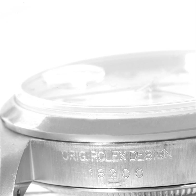 This image shows a close-up angle of the side of the Rolex Datejust 16200 Men's Stainless Steel White Dial 16200 Men's Stainless Steel White Dial watch case, highlighting its bezel and part of the reference number.