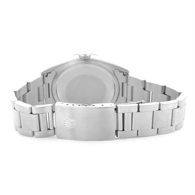 This image showcases the back view of a Rolex Datejust 16200 Men's Stainless Steel White Dial 16200 Men's Stainless Steel White Dial watch, including the bracelet and clasp.