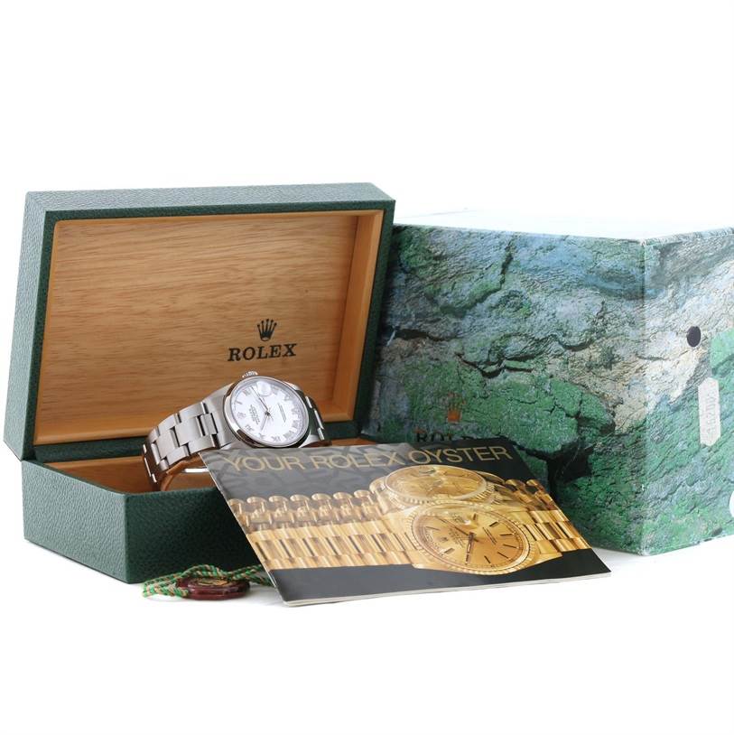 The image shows a Rolex Datejust 16200 Men's Stainless Steel White Dial 16200 Men's Stainless Steel White Dial watch in its open box with the booklet and outer box visible.