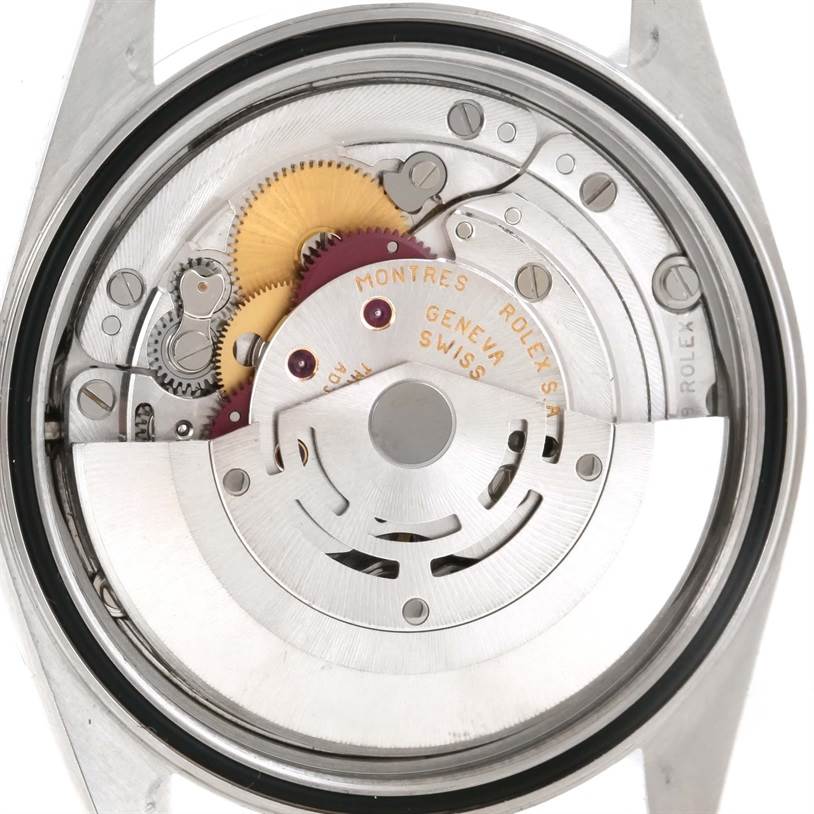 This image displays the inner mechanism of a Rolex Datejust 16200 Men's Stainless Steel White Dial 16200 Men's Stainless Steel White Dial watch, viewed from the back, showcasing its automatic movement components.