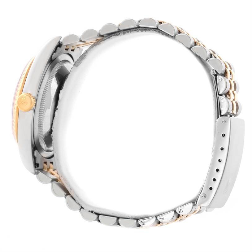 The Rolex Datejust 16233 Men's Steel and Gold (two tone) White Dial 16233 Men's Steel and Gold (two tone) White Dial watch is shown from a side angle, displaying the crown and bracelet.