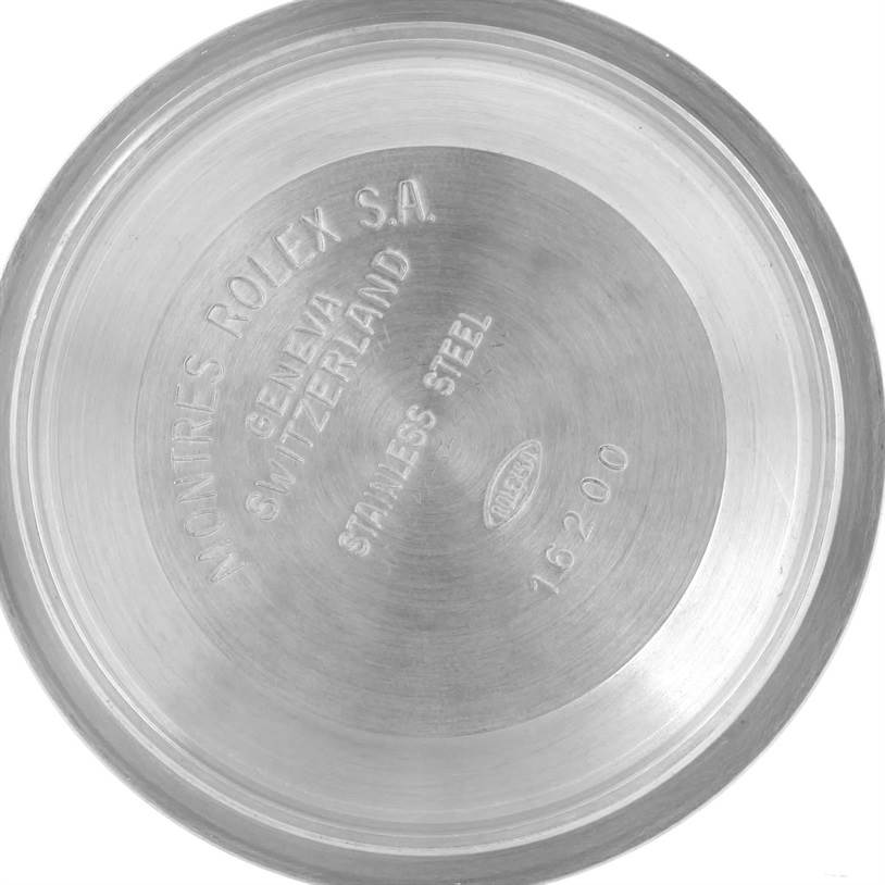 This image shows the interior of the case back for a Rolex Datejust 16233 Men's Steel and Gold (two tone) White Dial 16233 Men's Steel and Gold (two tone) White Dial watch, engraved with model and material details.