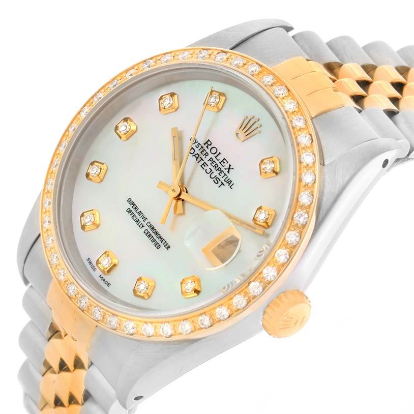 The Rolex Datejust 16233 Men
s Steel and Gold (two tone) Mother of Pearl Dial 16233 Men
s Steel and Gold (two tone) Mother of Pearl Dial watch is shown at an oblique angle, highlighting its dial, diamond bezel, and two-tone bracelet.