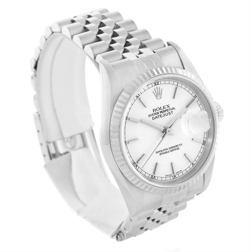 The image shows a side-angle view of a Rolex Datejust 16234 Men
s Stainless Steel White Dial 16234 Men
s Stainless Steel White Dial watch, highlighting its face, fluted bezel, and Jubilee bracelet.