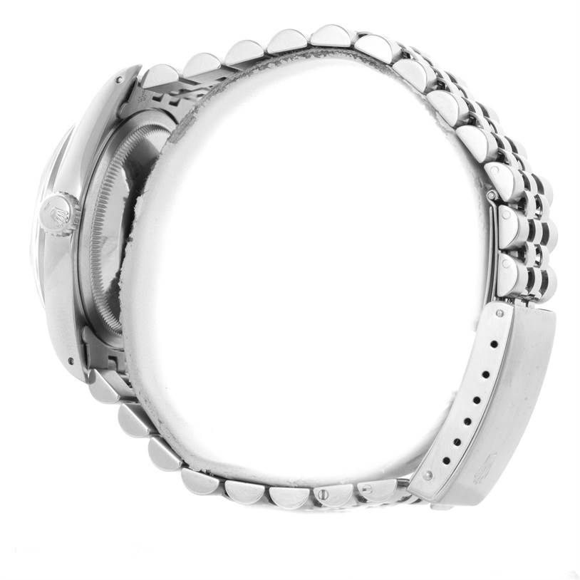 This image shows a side view of the Rolex Datejust 16200 Men's Stainless Steel Silver Dial 16200 Men's Stainless Steel Silver Dial watch, displaying its bracelet, clasp, and side of the case.