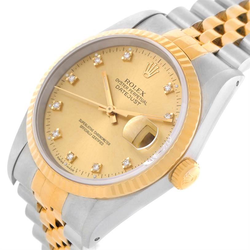 The image shows a close-up of a Rolex Datejust 16233 Men's Steel and Gold (two tone) Champagne Dial 16233 Men's Steel and Gold (two tone) Champagne Dial watch at an angle, highlighting the gold dial, bezel, and Jubilee bracelet.
