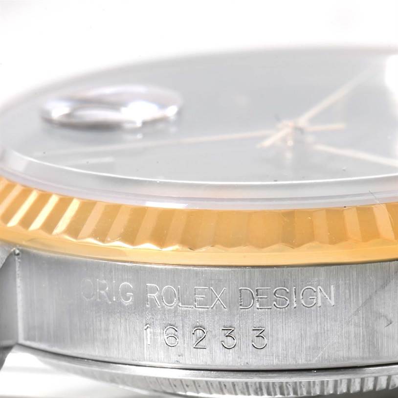 The image shows a close-up side view of the bezel and case of a Rolex Datejust 16233 Men's Steel and Gold (two tone) Black Dial 16233 Men's Steel and Gold (two tone) Black Dial watch, featuring the model number 16233.