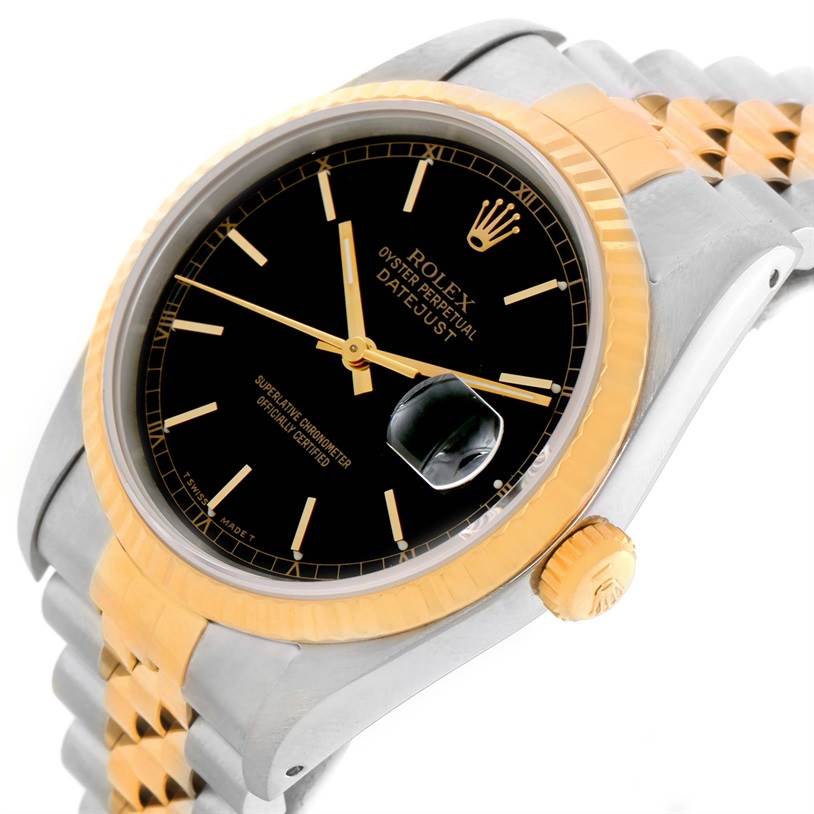The image shows a close-up angled view of a Rolex Datejust 16233 Men's Steel and Gold (two tone) Black Dial 16233 Men's Steel and Gold (two tone) Black Dial watch, highlighting the black dial, gold fluted bezel, and two-tone bracelet.