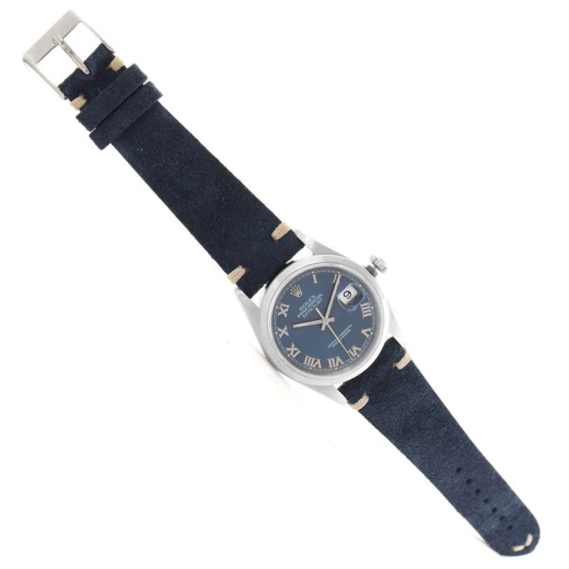 The image shows a Rolex Datejust 16200 Men's Stainless Steel Blue Dial 16200 Men's Stainless Steel Blue Dial watch from a top-down angle, featuring the face, case, and entire strap.