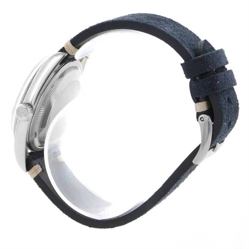 This image shows a side view of a Rolex Datejust 16200 Men's Stainless Steel Blue Dial 16200 Men's Stainless Steel Blue Dial watch, highlighting its case, crown, and leather strap.