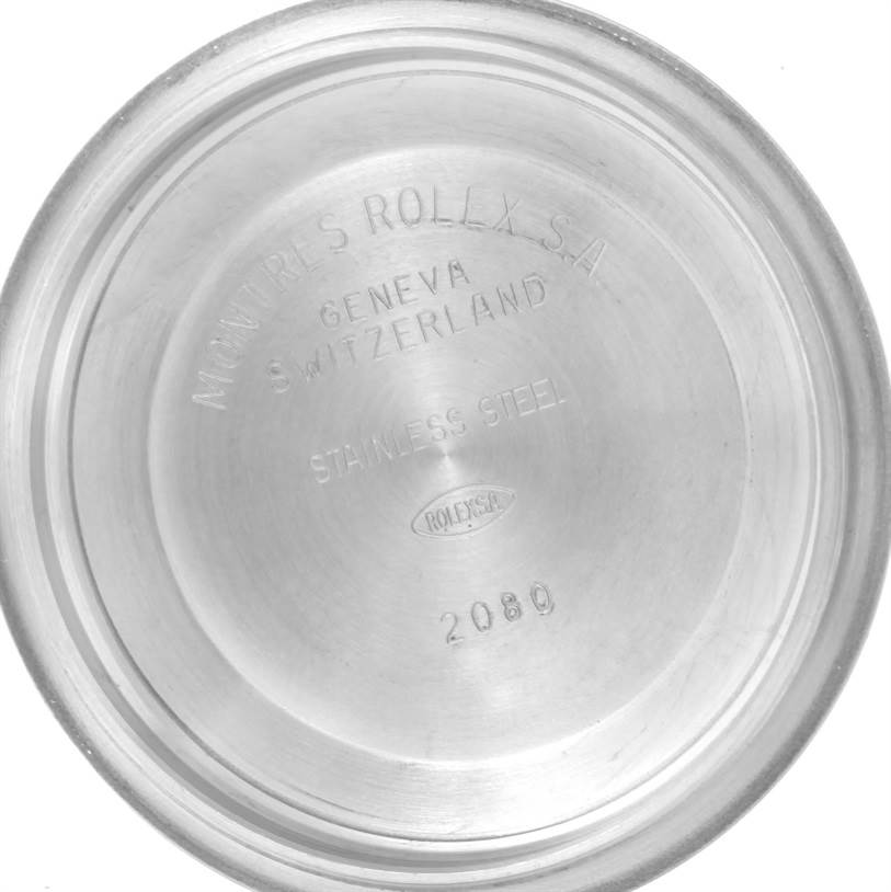 This is an interior view of the case back of a Rolex Datejust 16233 Men's Steel and Gold (two tone) Champagne Dial 16233 Men's Steel and Gold (two tone) Champagne Dial watch, showing engravings and the stainless steel material.