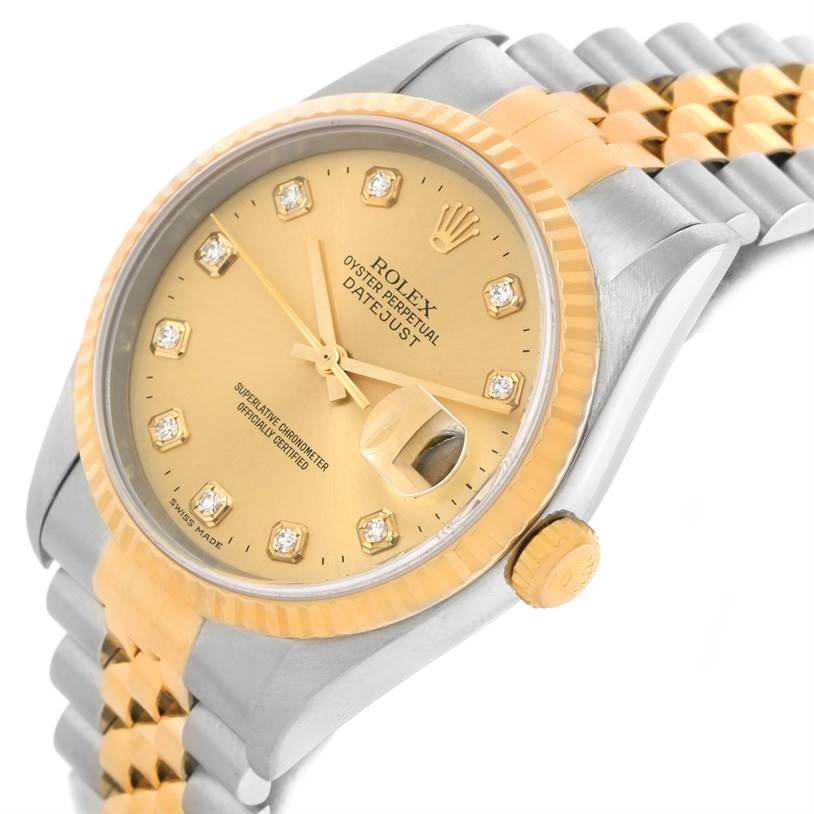 The image shows a Rolex Datejust 16233 Men's Steel and Gold (two tone) Champagne Dial 16233 Men's Steel and Gold (two tone) Champagne Dial watch at a slight angle, focusing on the gold dial, diamond hour markers, bezel, and partial bracelet.