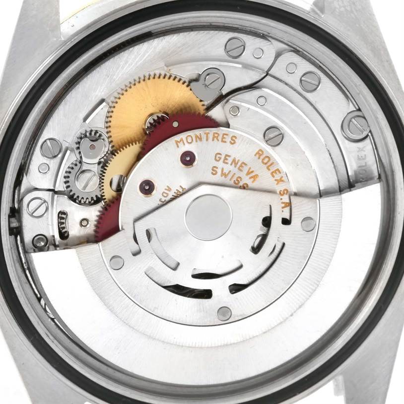 This image shows the internal mechanism and movement of a Rolex Datejust 16233 Men's Steel and Gold (two tone) Champagne Dial 16233 Men's Steel and Gold (two tone) Champagne Dial watch from the back case view.