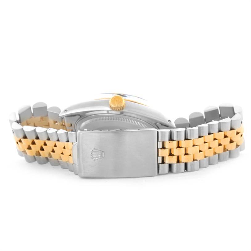 The image shows the back view of a Rolex Datejust 16013 Men
s Stainless Steel Black Dial 16013 Men
s Stainless Steel Black Dial watch, highlighting the clasp and two-tone bracelet.