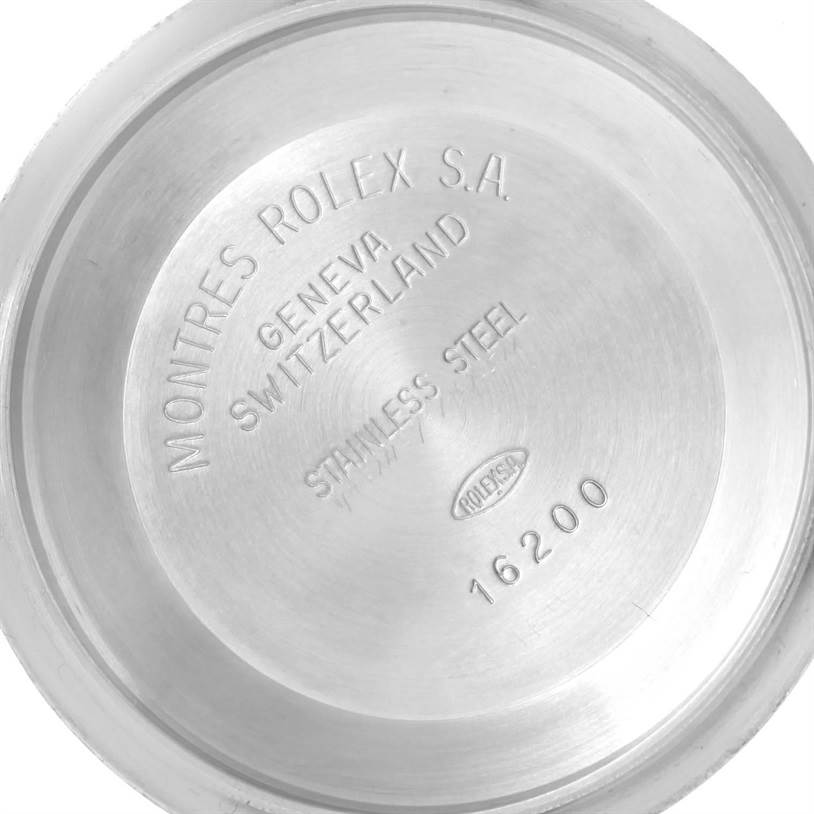 This image shows the inside case back of a Rolex Datejust 16233 Men's Steel and Gold (two tone) Champagne Dial 16233 Men's Steel and Gold (two tone) Champagne Dial watch, featuring engravings and model information.