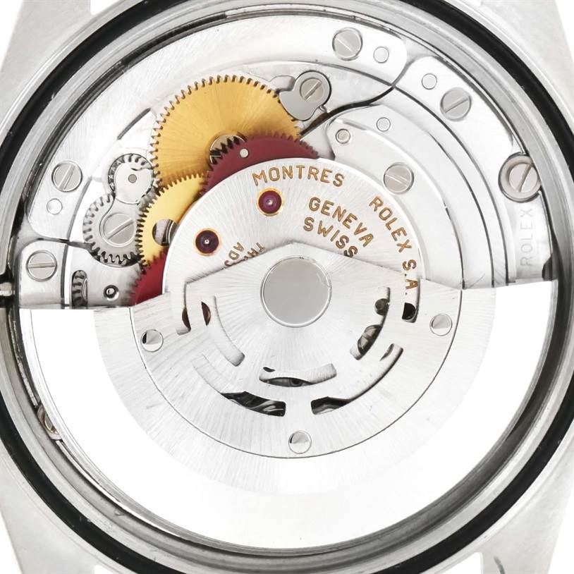 The image shows a close-up of the movement mechanism inside a Rolex Datejust 16233 Men's Steel and Gold (two tone) Champagne Dial 16233 Men's Steel and Gold (two tone) Champagne Dial watch.