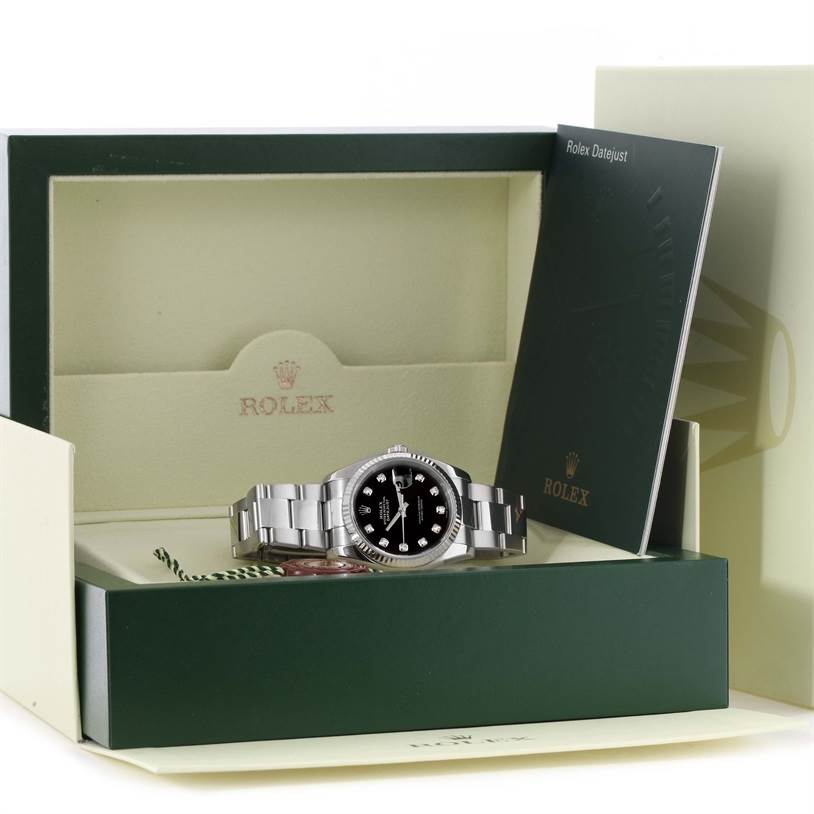 The image shows a Rolex Datejust 116234BKDO Men's Stainless Steel Silver Dial 116234BKDO Men's Stainless Steel Silver Dial watch in an open box with documentation and accessories.