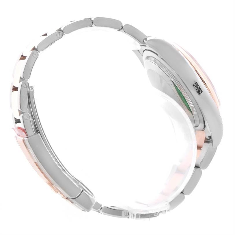 The image shows a side profile of a Rolex Datejust 116201PKRO Men's Steel and Gold (two tone) Pink Dial 116201PKRO Men's Steel and Gold (two tone) Pink Dial watch, highlighting the bracelet and case.