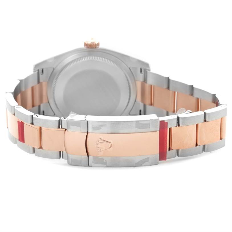 The image shows the clasp and bracelet of a Rolex Datejust 116201PKRO Men's Steel and Gold (two tone) Pink Dial 116201PKRO Men's Steel and Gold (two tone) Pink Dial watch, viewed from the back angle.