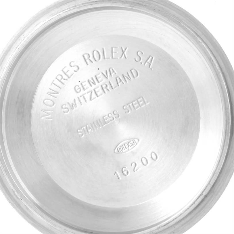 This image shows the interior side of the case back of a Rolex Datejust 16220 Men's Stainless Steel Silver Dial 16220 Men's Stainless Steel Silver Dial watch, model 16200, made of stainless steel.
