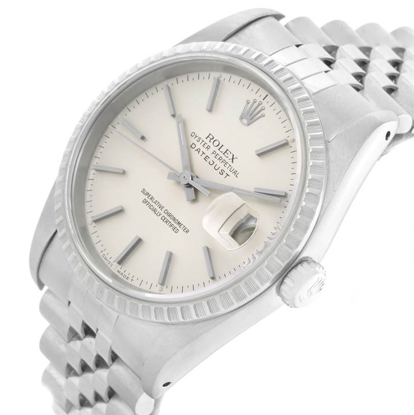 The image showcases a close-up, angled view of the face and bracelet of a Rolex Datejust 16220 Men's Stainless Steel Silver Dial 16220 Men's Stainless Steel Silver Dial watch.