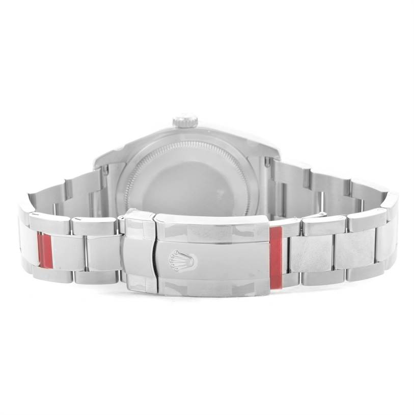 The image shows the back and bracelet of a Rolex Datejust 116200BKAO Men
s Stainless Steel Black Dial 116200BKAO Men
s Stainless Steel Black Dial watch, highlighting the clasp and links.