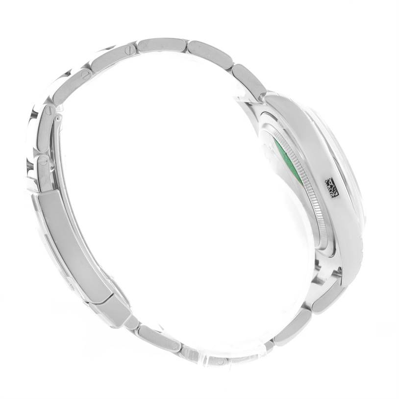 The image shows a side profile of a Rolex Datejust 116200BKAO Men
s Stainless Steel Black Dial 116200BKAO Men
s Stainless Steel Black Dial watch, highlighting its bracelet and case.