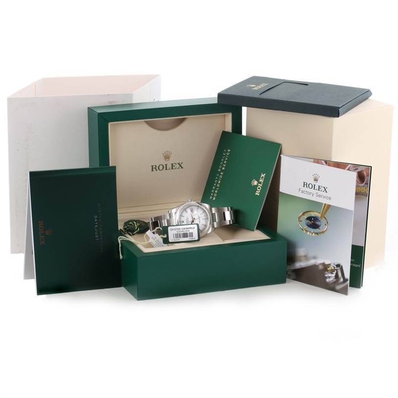 The Rolex Datejust 116200WSO Men's Stainless Steel White Dial 116200WSO Men's Stainless Steel White Dial watch is shown in its box with accompanying booklets and packaging at an angled top-down view.