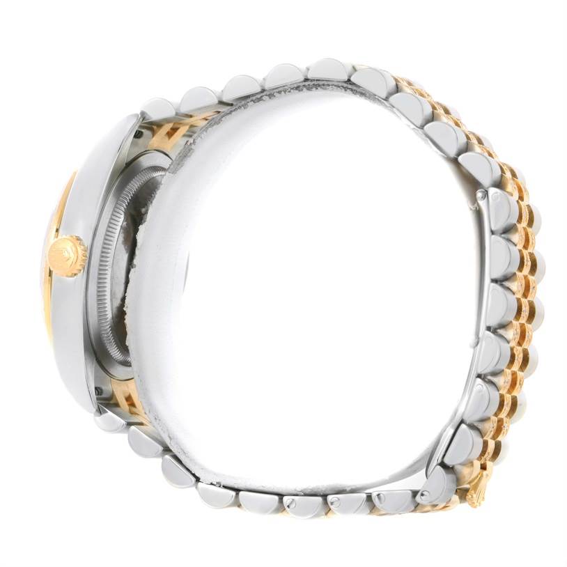 The image shows a side view of a Rolex Datejust 116243 Men
s Stainless Steel Black Dial 116243 Men
s Stainless Steel Black Dial watch, highlighting the case, crown, and two-tone bracelet.