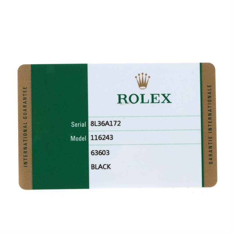 This image shows the international guarantee card for a Rolex Datejust 116243 Men
s Stainless Steel Black Dial 116243 Men
s Stainless Steel Black Dial model 116243 watch, displaying serial number, model, and color details.