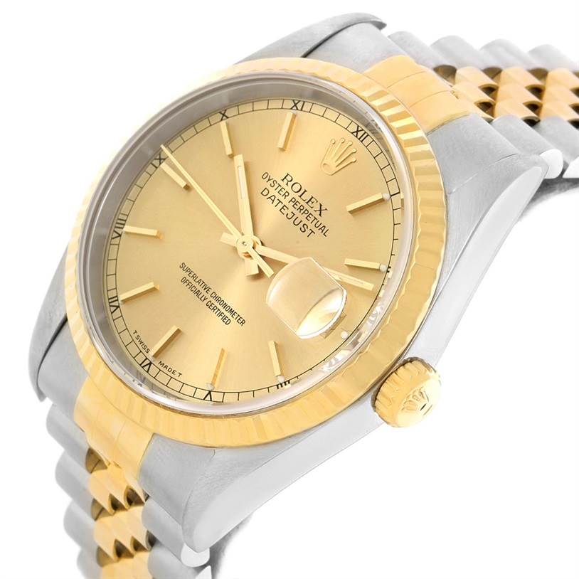 The image shows a Rolex Datejust 16233 Men's Steel and Gold (two tone) Champagne Dial 16233 Men's Steel and Gold (two tone) Champagne Dial watch from an angled side view, highlighting its gold dial, bezel, bracelet, and crown.