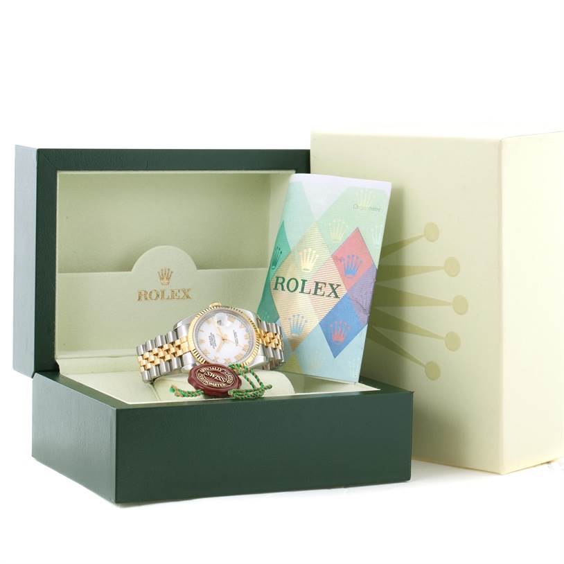 The image shows a Rolex Datejust 116233 Men
s Stainless Steel White Dial 116233 Men
s Stainless Steel White Dial watch with its box, booklet, and tags.