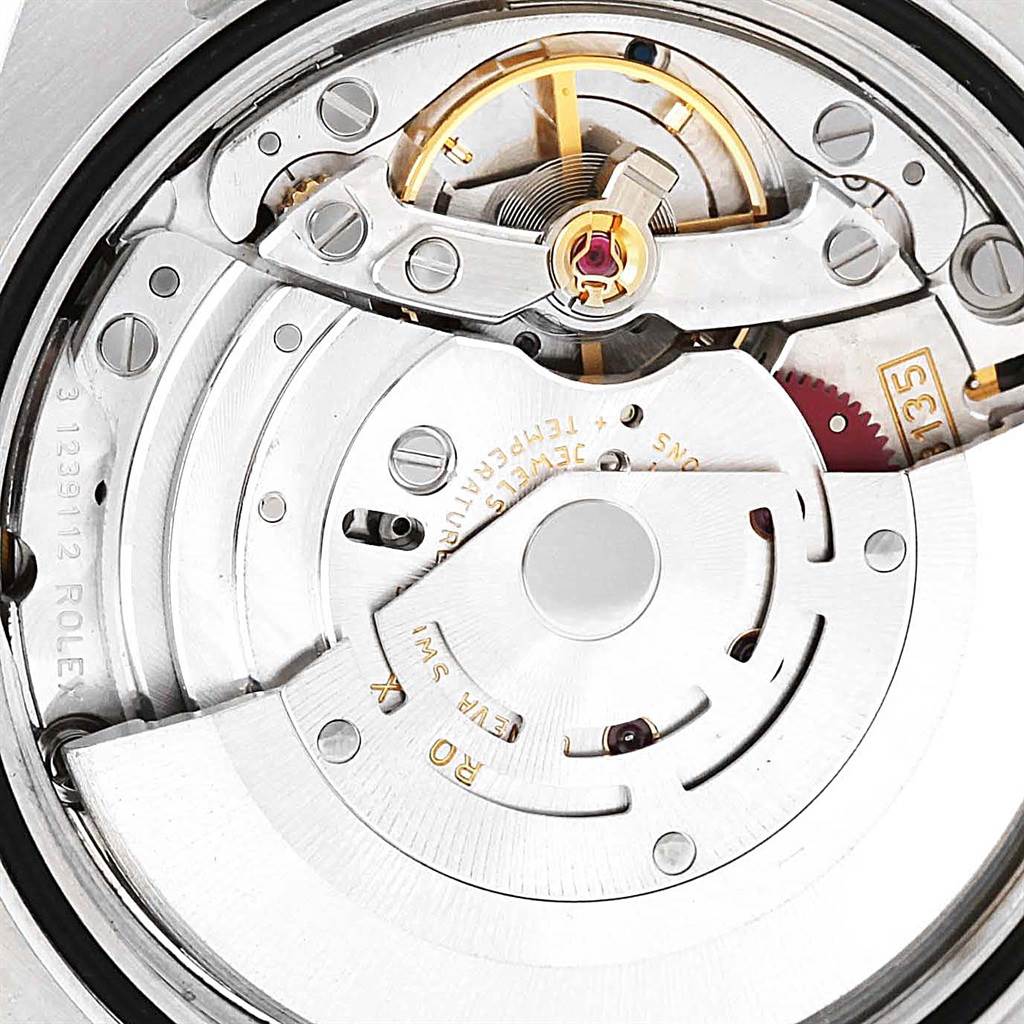 This image shows a close-up view of the inner mechanical movement of a Rolex Datejust 116234 Men's Stainless Steel Black Dial 116234 Men's Stainless Steel Black Dial watch.