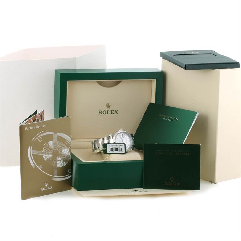 The Rolex Datejust 116234 Men
s Stainless Steel Grey Dial 116234 Men
s Stainless Steel Grey Dial watch is displayed in its box, accompanied by manuals and additional packaging.