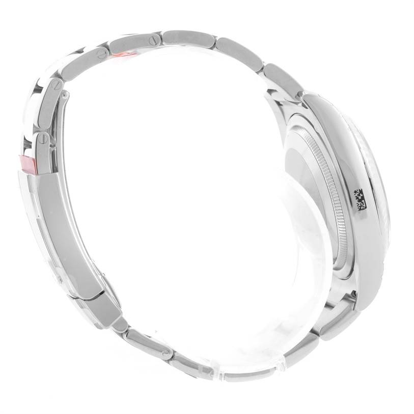 The image shows a Rolex Datejust 116234 Men
s Stainless Steel Grey Dial 116234 Men
s Stainless Steel Grey Dial watch from a side angle, highlighting its bracelet and part of the caseback.