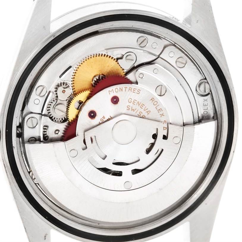 The image shows the internal mechanisms of a Rolex Datejust 16234 Men's Stainless Steel White Dial 16234 Men's Stainless Steel White Dial watch viewed from the rear.