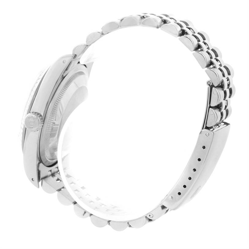 The image shows a side view of the Rolex Datejust 16234 Men's Stainless Steel White Dial 16234 Men's Stainless Steel White Dial watch, highlighting its crown, case, and partially closed bracelet.