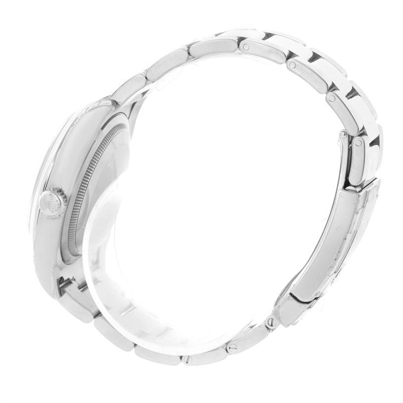 The image shows the right side view of a Rolex Datejust 116200BKSO Men's Stainless Steel Black Dial 116200BKSO Men's Stainless Steel Black Dial watch, highlighting the crown and bracelet links.