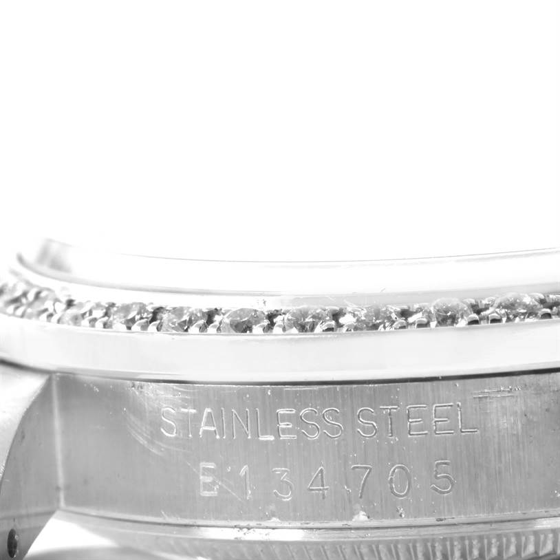 This image shows a close-up of the Rolex Datejust 16234 Men
s Stainless Steel Mother of Pearl Dial 16234 Men
s Stainless Steel Mother of Pearl Dial model
s bezel and the engraving "Stainless Steel" on the case.