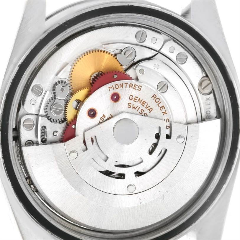 The image shows the internal movement mechanism of a Rolex Datejust 16234 Men
s Stainless Steel Mother of Pearl Dial 16234 Men
s Stainless Steel Mother of Pearl Dial watch viewed from the back.