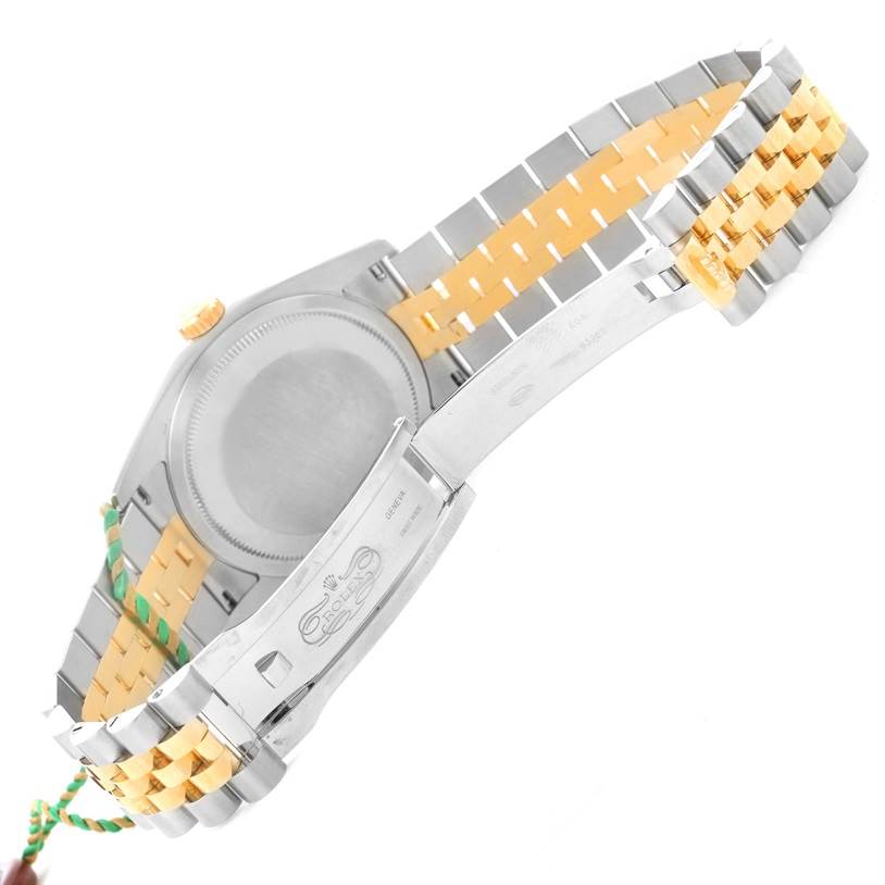 The image shows the back and clasp of a Rolex Datejust 116233-CSJ Men
s Stainless Steel Champagne Dial 116233-CSJ Men
s Stainless Steel Champagne Dial watch, displaying the two-tone metal bracelet and case back.