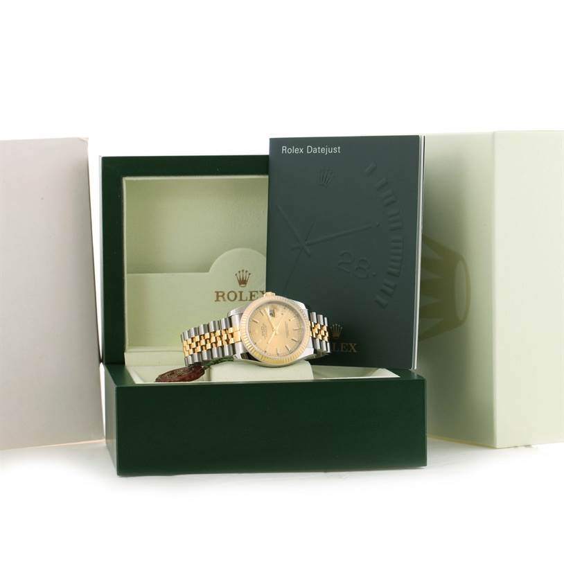 This image shows a Rolex Datejust 116233-CSJ Men
s Stainless Steel Champagne Dial 116233-CSJ Men
s Stainless Steel Champagne Dial watch in its box, with the warranty card and packaging all visible from a front angle.